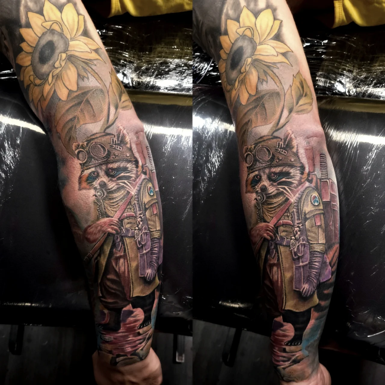 A detailed forearm tattoo featuring a raccoon dressed in steampunk attire, complete with goggles and a jacket, holding a pipe, with a large yellow sunflower above its head.
