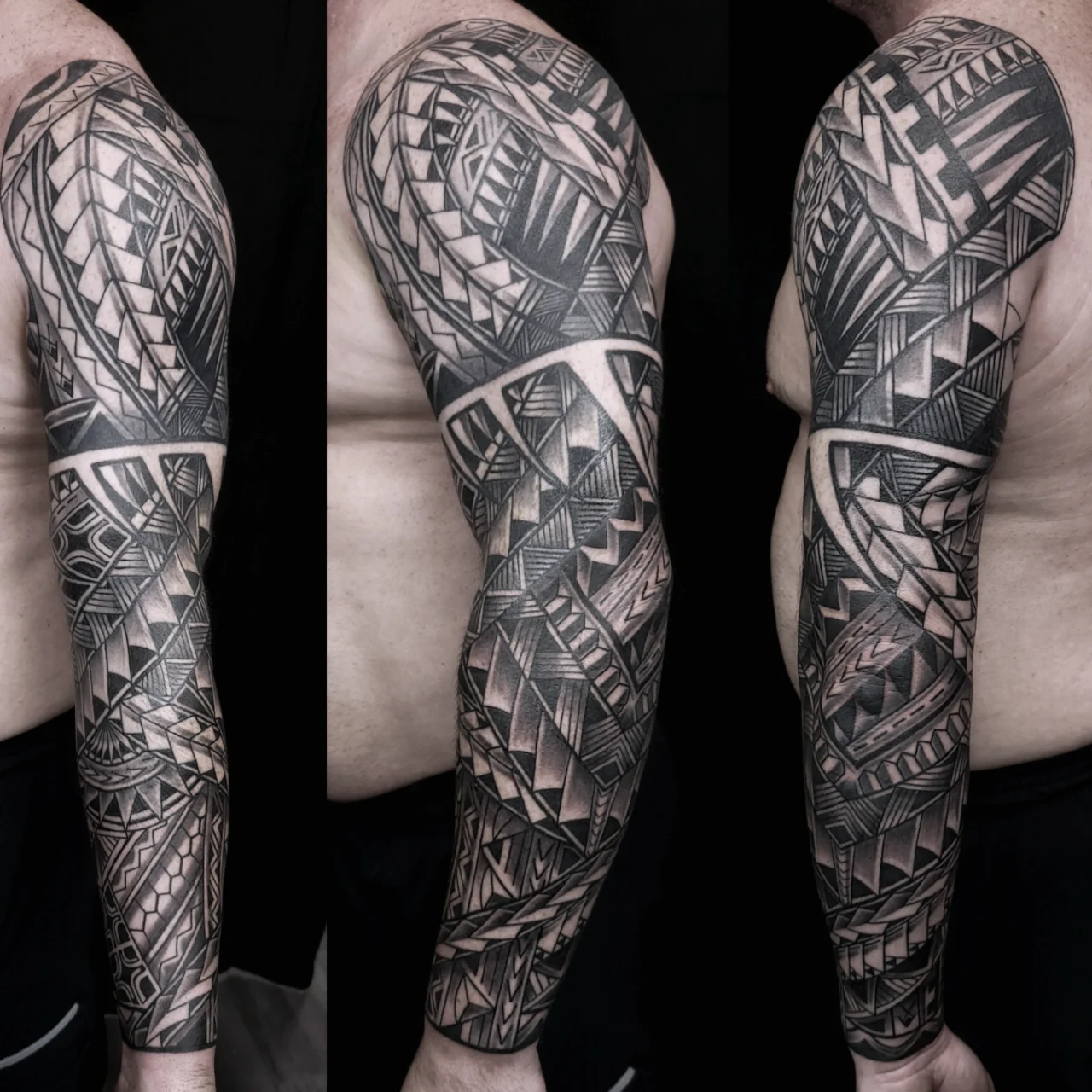A person’s arm is covered in a detailed black and grey geometric Polynesian-style tattoo sleeve, featuring intricate patterns, lines, and shapes, photographed from three side angles against a dark background.