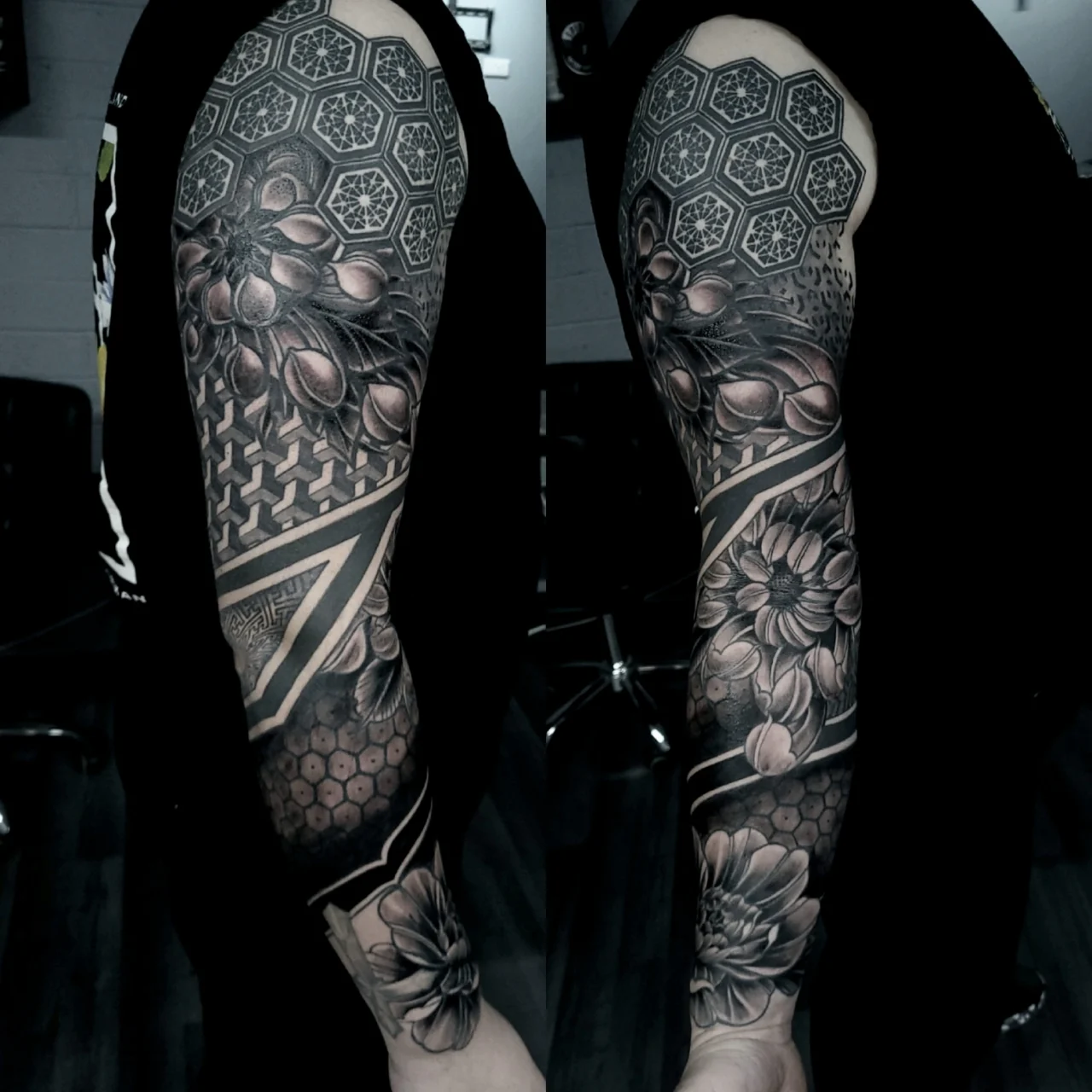 A black and grey full sleeve tattoo featuring geometric patterns, honeycomb shapes, flowers, and leaves, with intricate shading and bold contrast, shown from two angles on a person’s arm.