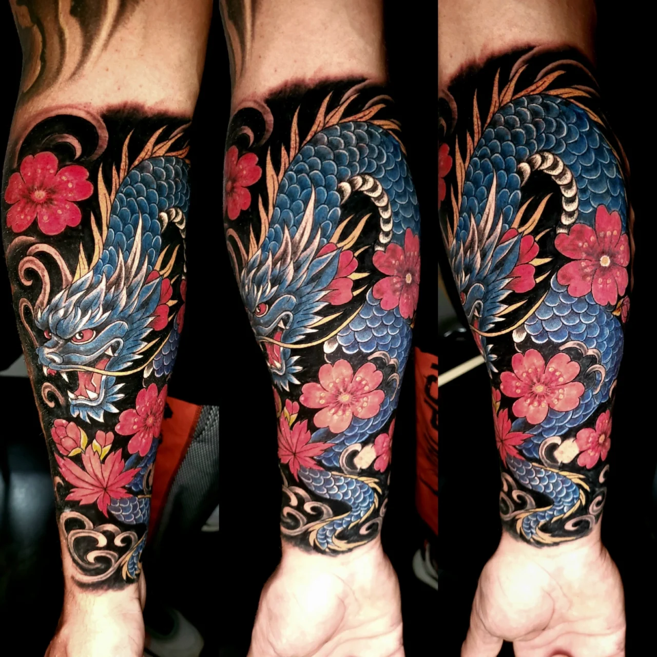 Forearm tattoo featuring a blue dragon with detailed scales, surrounded by pink cherry blossoms and gold accents, set against a black background. The image shows three angles of the same tattoo.